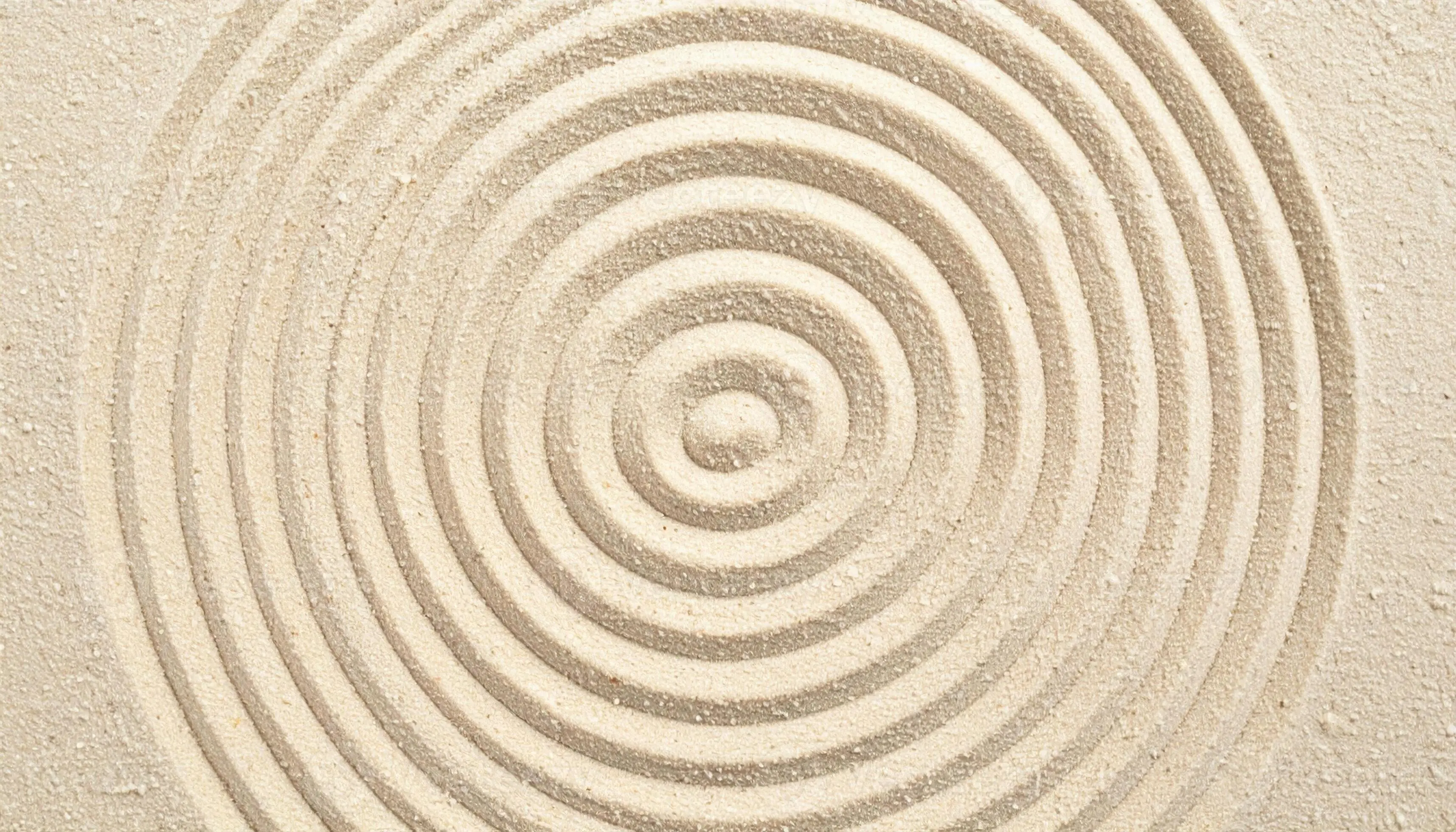 Concentric circles in sage tones suggesting a calm focal point